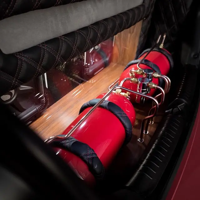 Custom red air tank fabricated into a trunk