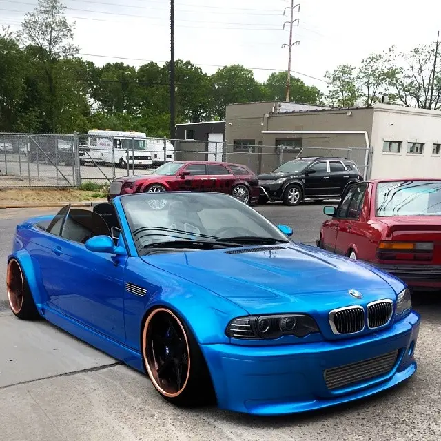 Blue BMW M3 convertible on air suspension