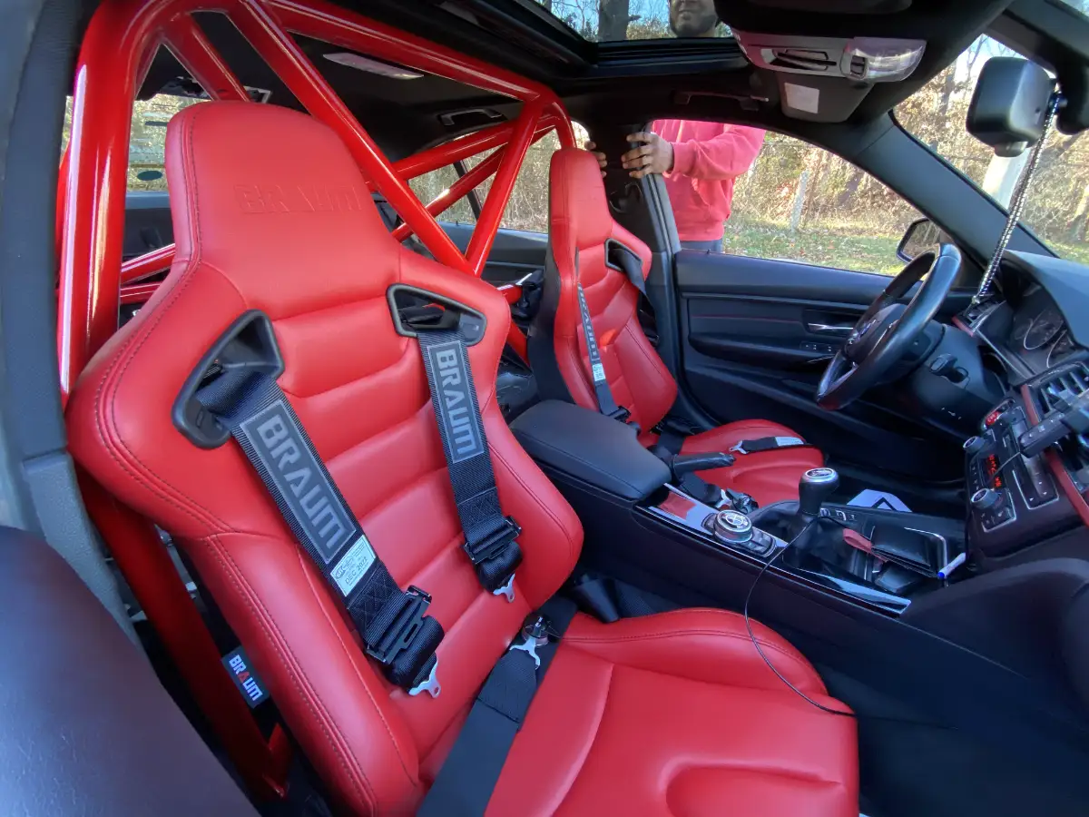 Red leather racing seats and roll cage interior